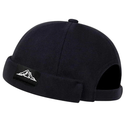 The Mountain Brimless Docker Cap
